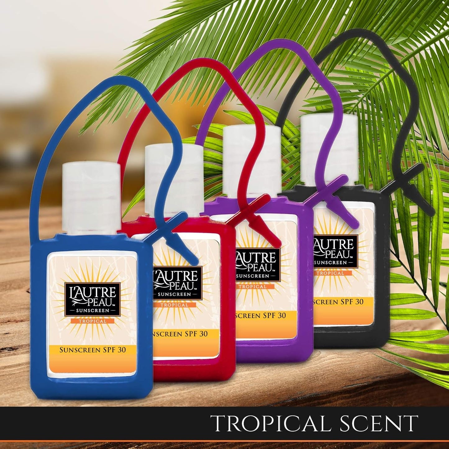 SPF 30 Sunscreen Multi-Pack by L'AUTRE PEAU | Travel Size Sunscreen for Men, Women & Kids | Non-Greasy, Water Resistant | Tropical Scent | TSA Approved | 4 Pack With Travel Strap