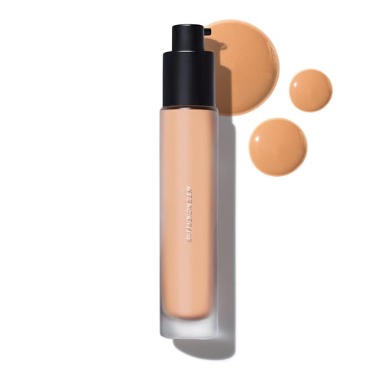 MAKE Beauty Diffusion Dew Skin Tint. Sheer to Medium Coverage Radiant Finish. Blurring, Smoothing, and Brightening for Glowing Complexion. Enhanced with Niacinamide and Adenosine. Tan 06