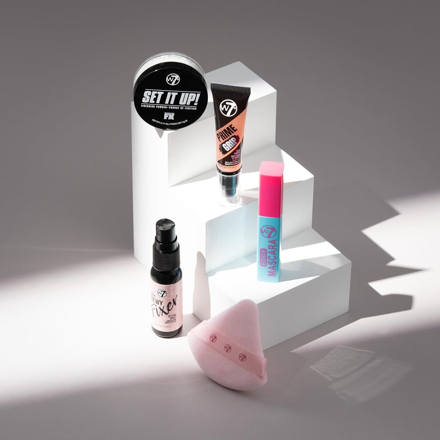 W7 On the Go Cuties Gift Set - Mini Makeup Essentials with Primer, Mascara, Setting Spray, Loose Powder & Powder Puff - Travel Size Beauty Favourites - Stocking Stuffer