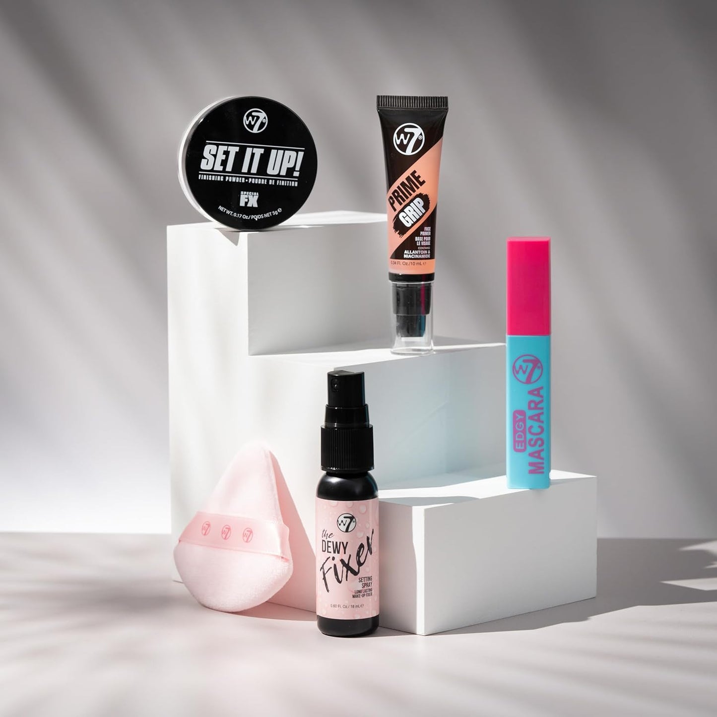 W7 On the Go Cuties Gift Set - Mini Makeup Essentials with Primer, Mascara, Setting Spray, Loose Powder & Powder Puff - Travel Size Beauty Favourites - Stocking Stuffer