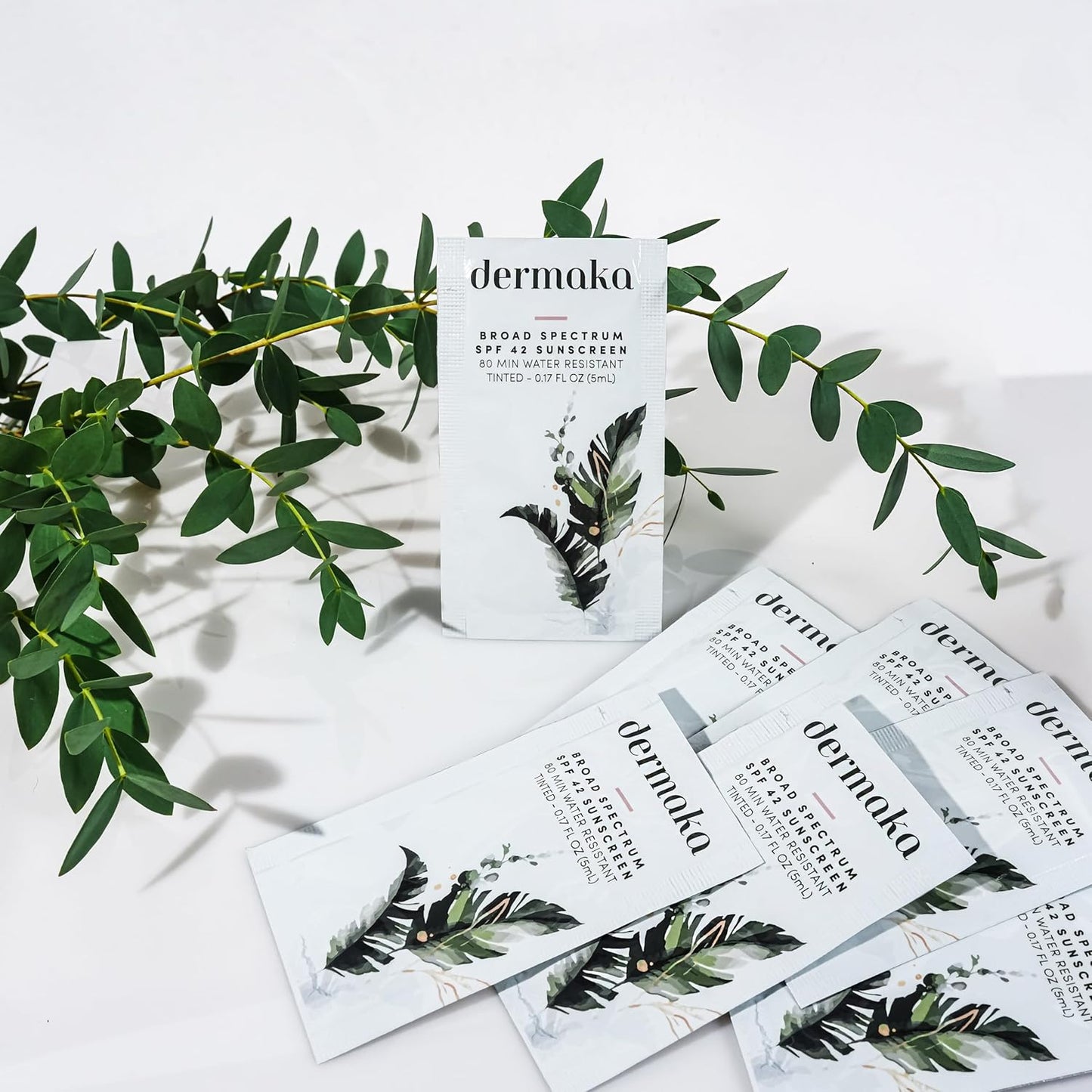 Dermaka Travel Size Sunscreen SPF 42 for Face & Body – 2-in-1 Lightly Tinted Mineral Sunscreen with Zinc Oxide & Titanium Dioxide – Skin Soothing, Water-Resistant 80 Min, 5ml 25 sachets