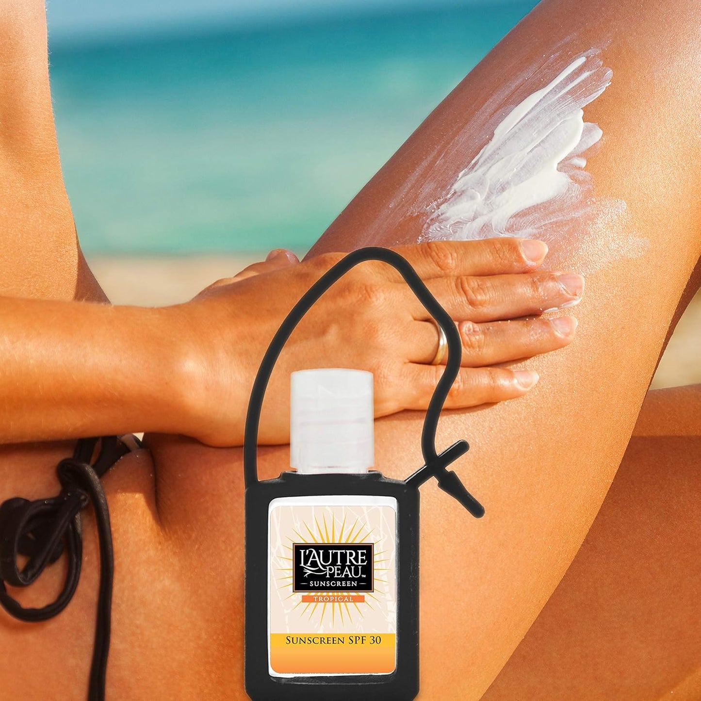 SPF 30 Sunscreen Multi-Pack by L'AUTRE PEAU | Travel Size Sunscreen for Men, Women & Kids | Non-Greasy, Water Resistant | Tropical Scent | TSA Approved | 4 Pack With Travel Strap